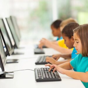 Children typing on a keyboard